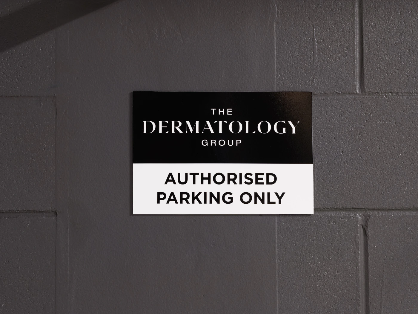 The Dermatology Group authorised parking only sign